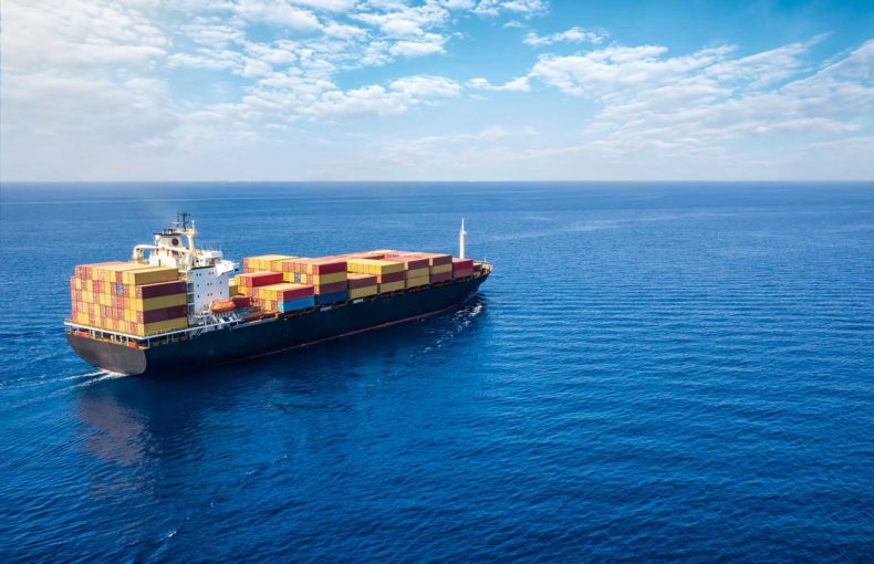 aerial view of a container cargo ship traveling on the open sea