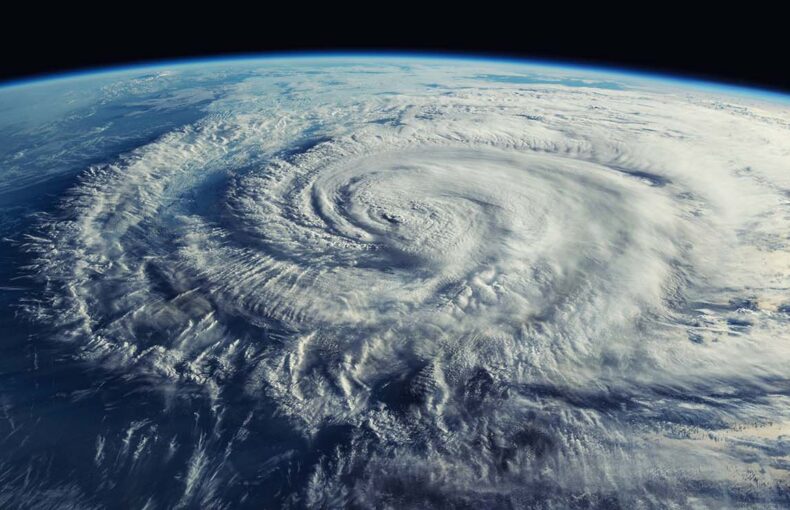 A view of a hurricane forming from space with the clouds circling around